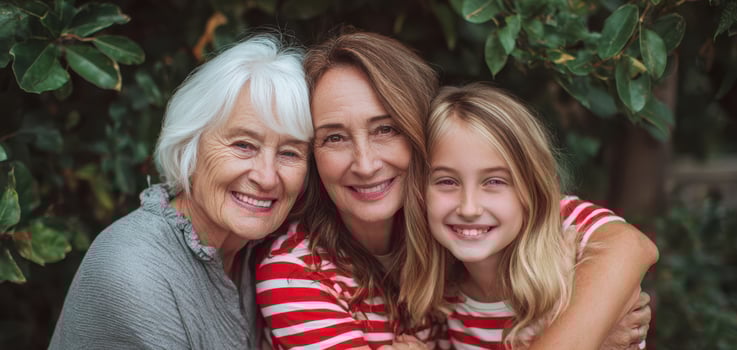 The loving embrace of three generations enjoying quality family time together. photo