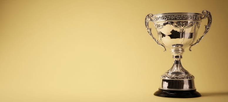 The shining trophy symbolizing achievement and excellence in competition. photo