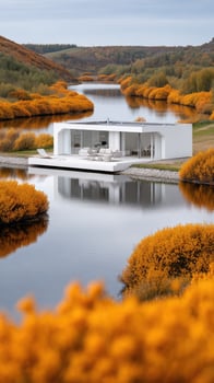 A white house sits on the edge of a lake photo