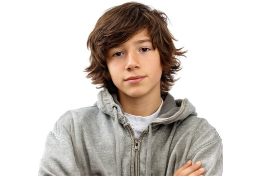 Young person portrait on white background with casual gray clothing photo
