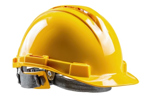 Yellow hard hat safety helmet for construction and industrial work head protection photo