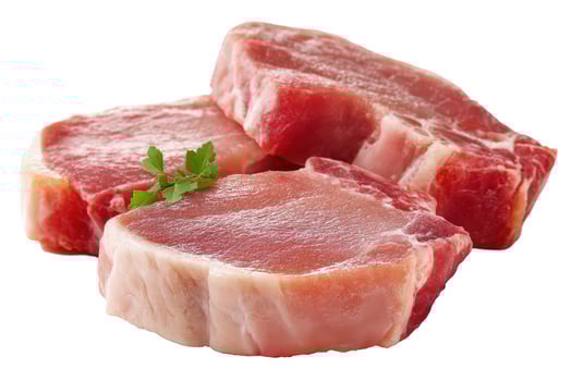 Raw pork chops with parsley garnish fresh meat protein source isolated overhead photo
