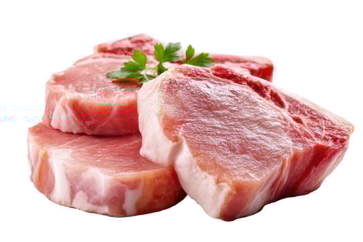 Raw pork chops stacked with parsley garnishing food photography photo