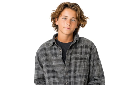 Portrait of young man with brown hair wearing checkered shirt on white background photo