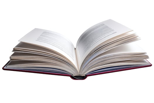 Open book with white pages and red cover against a white background photo