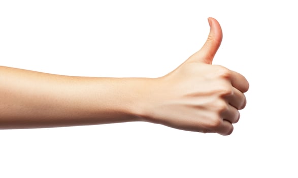 Hand gesture giving thumbs up on white background symbol of approval photo