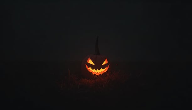 Halloween pumpkin with a scary face on it photo