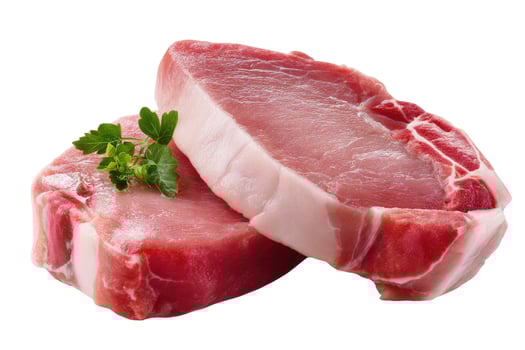 Fresh raw pork chops with herb garnish ready to cook photo