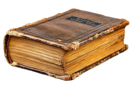 Antique leather book with aged paper pages close up photo