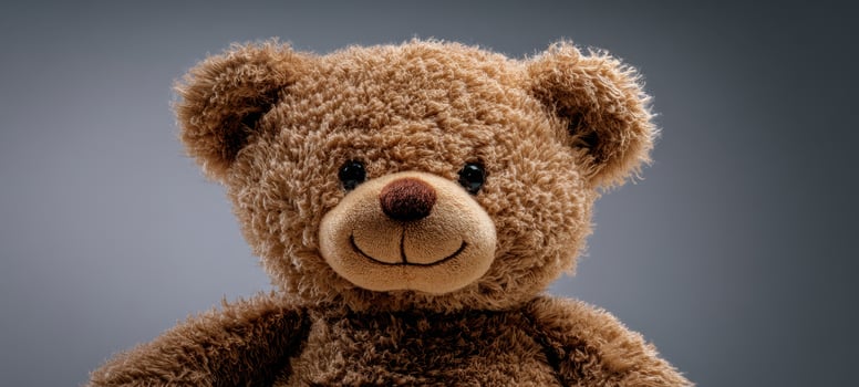 The adorable teddy bear exuding warmth and comfort for children and families. photo