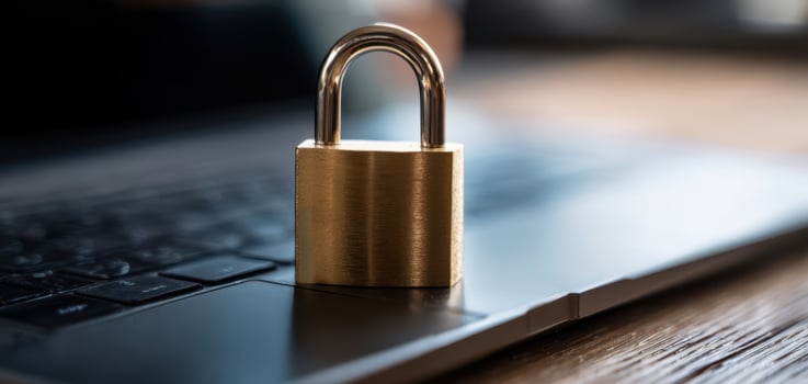 The padlock symbolizing security on a laptop keyboard for digital protection. photo