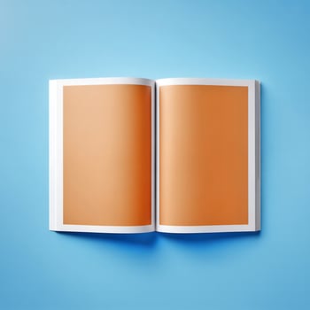 Open blank book or magazine mockup on a blue background photo