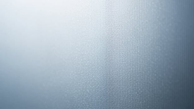 A close up of a white wall with a blue background photo