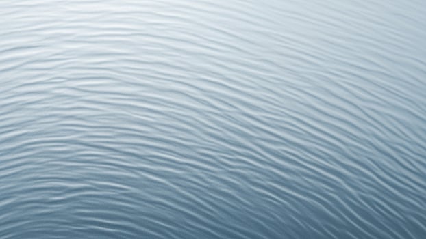 A close up of a wave on the surface of water photo