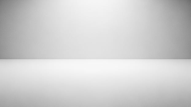White room with light and a white table photo