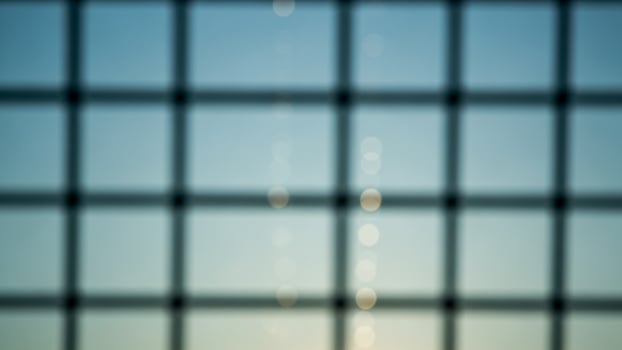 A view of a building through a window photo