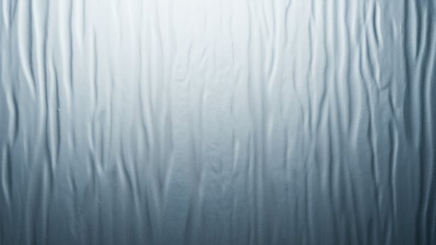 A blue and white background with some wavy lines photo