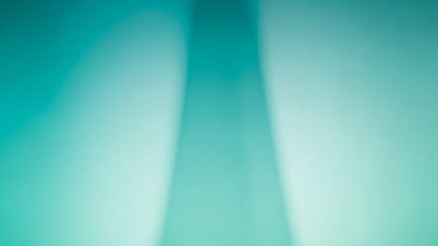 A blurry image of a person standing in front of a tall building photo