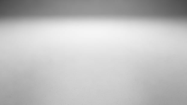 Black and white photo of a white room