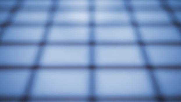 A blue tiled floor with a blue light shining through photo
