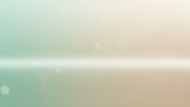 A blurry image of a light beam in the sky photo