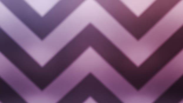 A purple and black chevron pattern on a blurred background photo