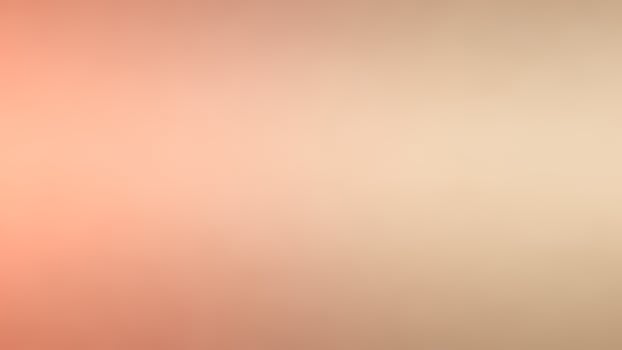 A blurry background with orange and pink colors photo