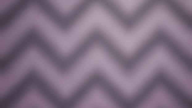 A purple and gray chevron pattern background photo