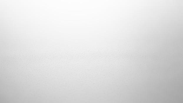 A white backgroundackground with a small spot of light photo