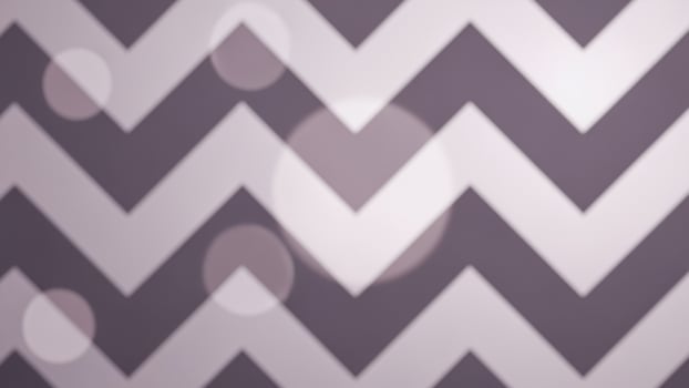 A chevron pattern is shown on a dark background photo