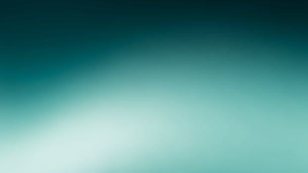 A blurry blue and green background with a light source photo