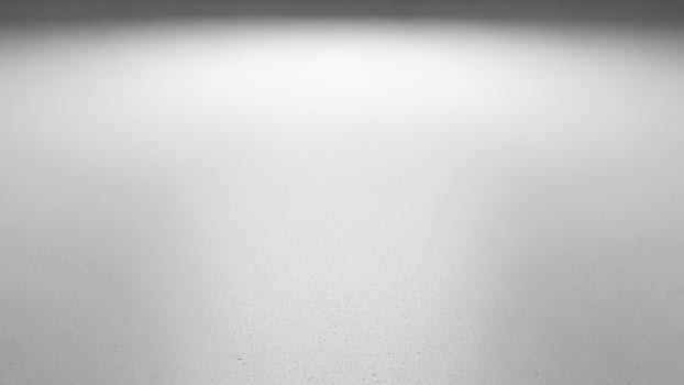 White light in a d a rk room with a spotlight photo