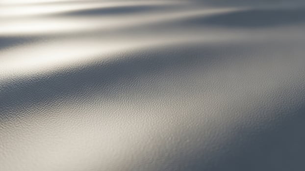 A white surface with some ripples in it photo