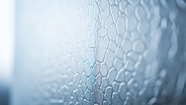 A close up of a frosted glass photo