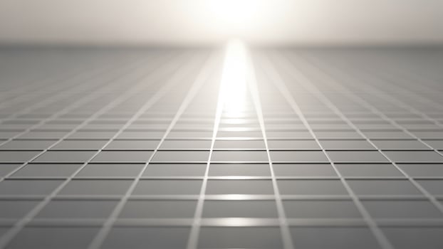 An empty room with a light shining through the floor photo