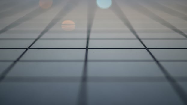 A blurry image of a grid of squares on a floor photo