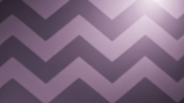 a purple a nd white chevron p a ttern on a w a ll photo