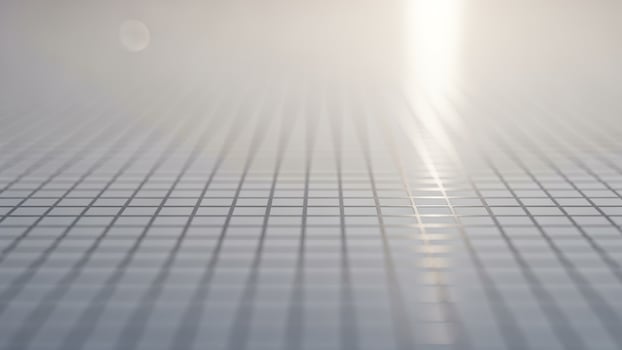 A close up of a grid of squares on a white surface photo