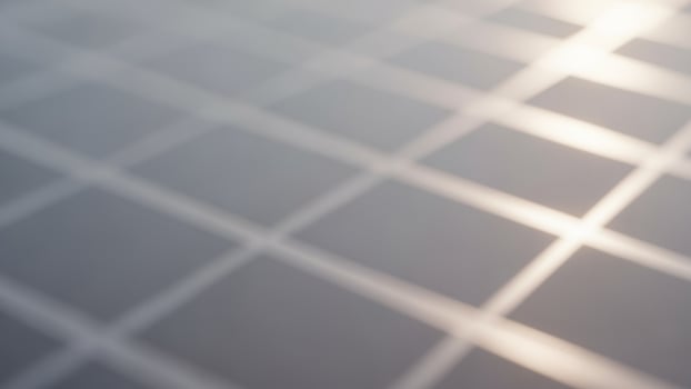 A background up of a grid of squares on a white surface photo