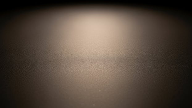 A dark background with a light shining on it photo