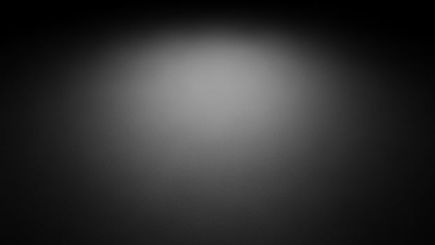 Black and white photo of a light in the dark