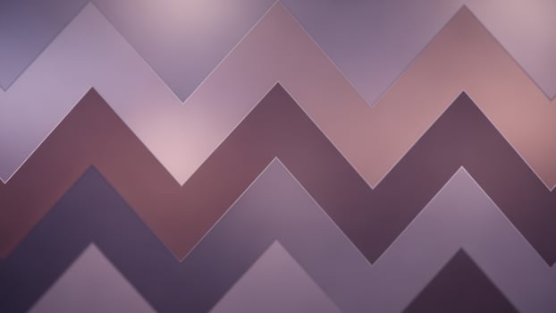 A purple and brown chevron pattern background photo