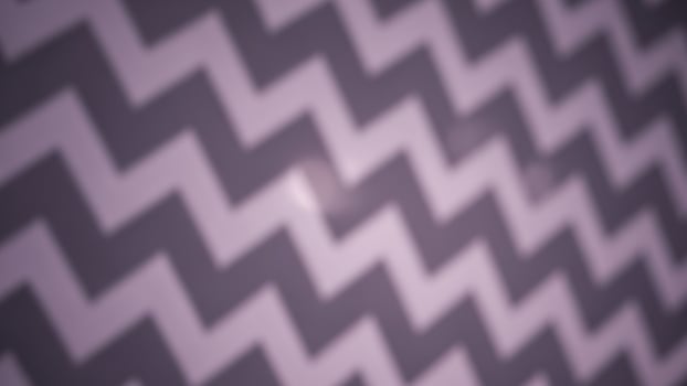 A zigzag pattern is shown on a black and white background photo