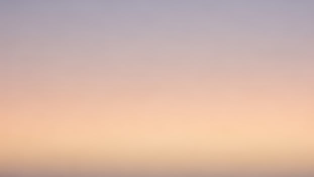 a pl a ne flying over the oce a n a t sunset photo