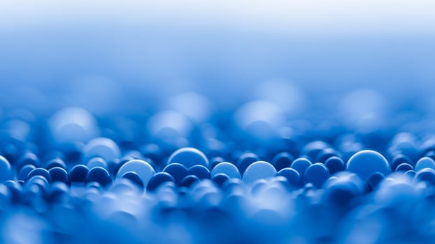Abstract blue background with many small blue spheres photo