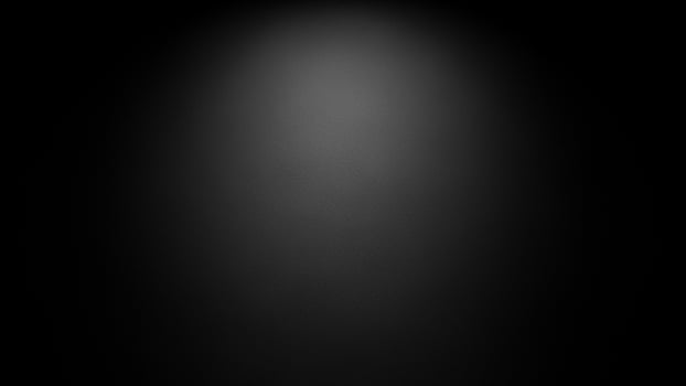 Black background with light coming from the top photo