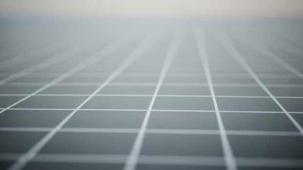 A grid of squares on a black surface photo