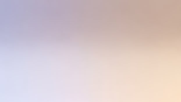 A blurry background with a blurred sky and clouds photo