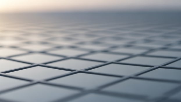 A close up of a metal grid with a sun shining through photo