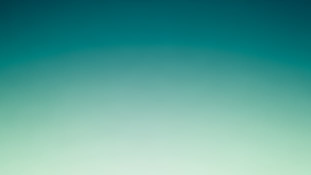A green and blue background with a blurred image photo